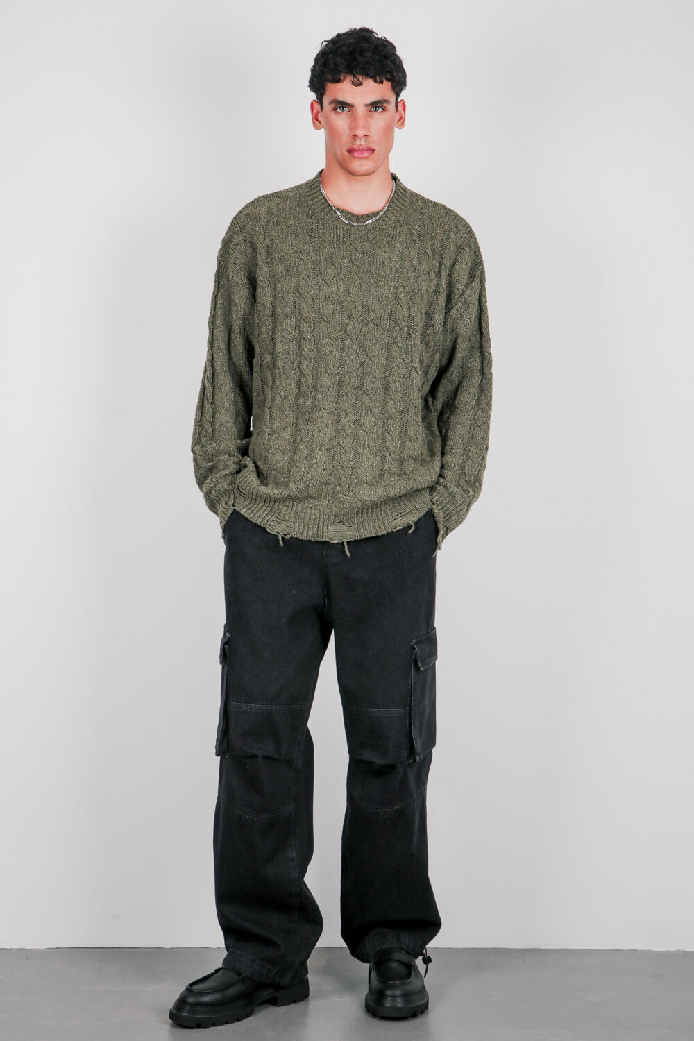 Πλεκτή μπλούζα με σχέδιο πλεξίδες