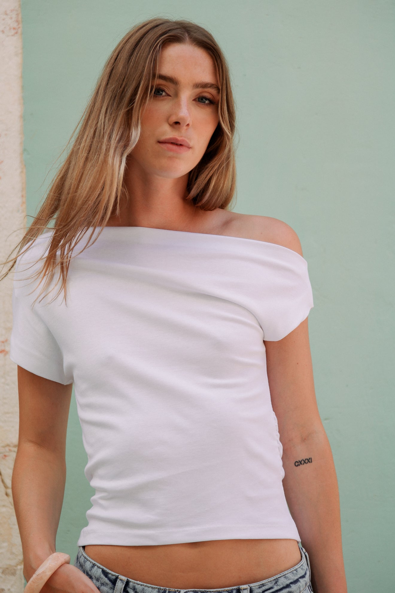 Ασύμμετρη μπλούζα ντραπέ